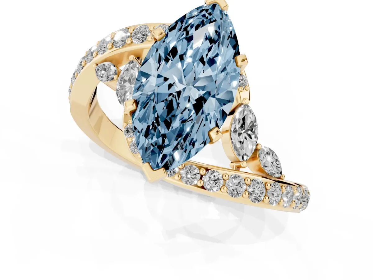 Fancy Blue Marquise Cut Solitaire with Pavé Twist Band and Four-Prong Setting Yellow gold