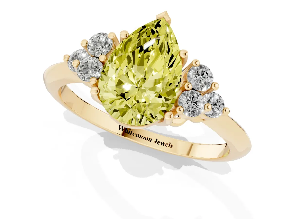 Fancy Yellow Pear Cut Cut Diamond Cluster Ring with Solitaire Band and Four-Prong Setting Yellow gold