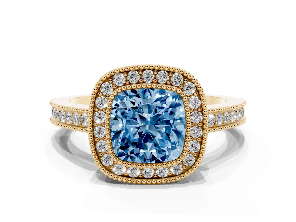 Fancy Blue Cushion Cut Cut Halo Diamond Ring with Pavé Band and Milgrain Prong Setting Yellow gold
