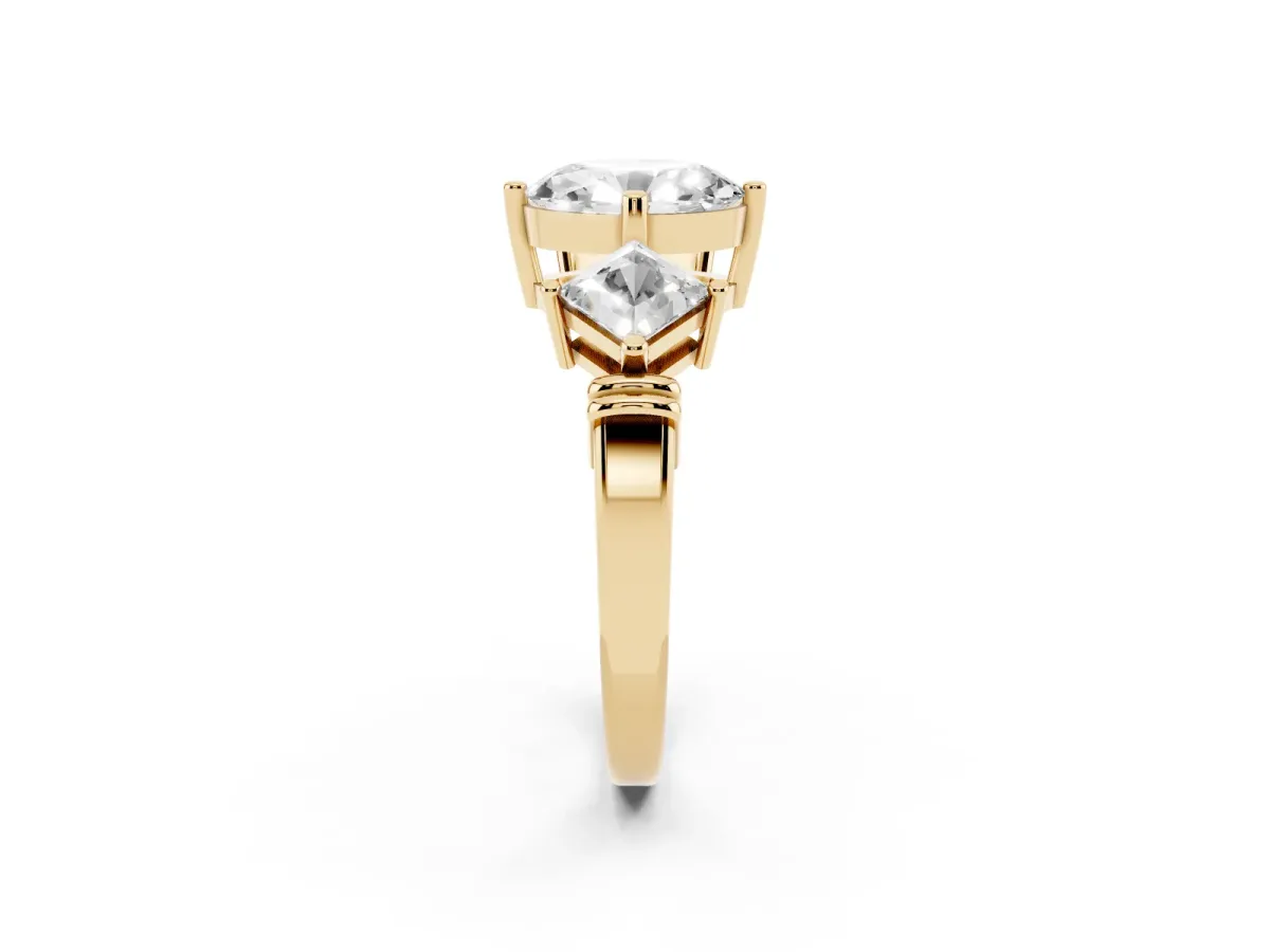 Three-Stone Oval Cut and Princess Cut Diamond Ring with Channel Band and Four-Prong Setting Yellow gold
