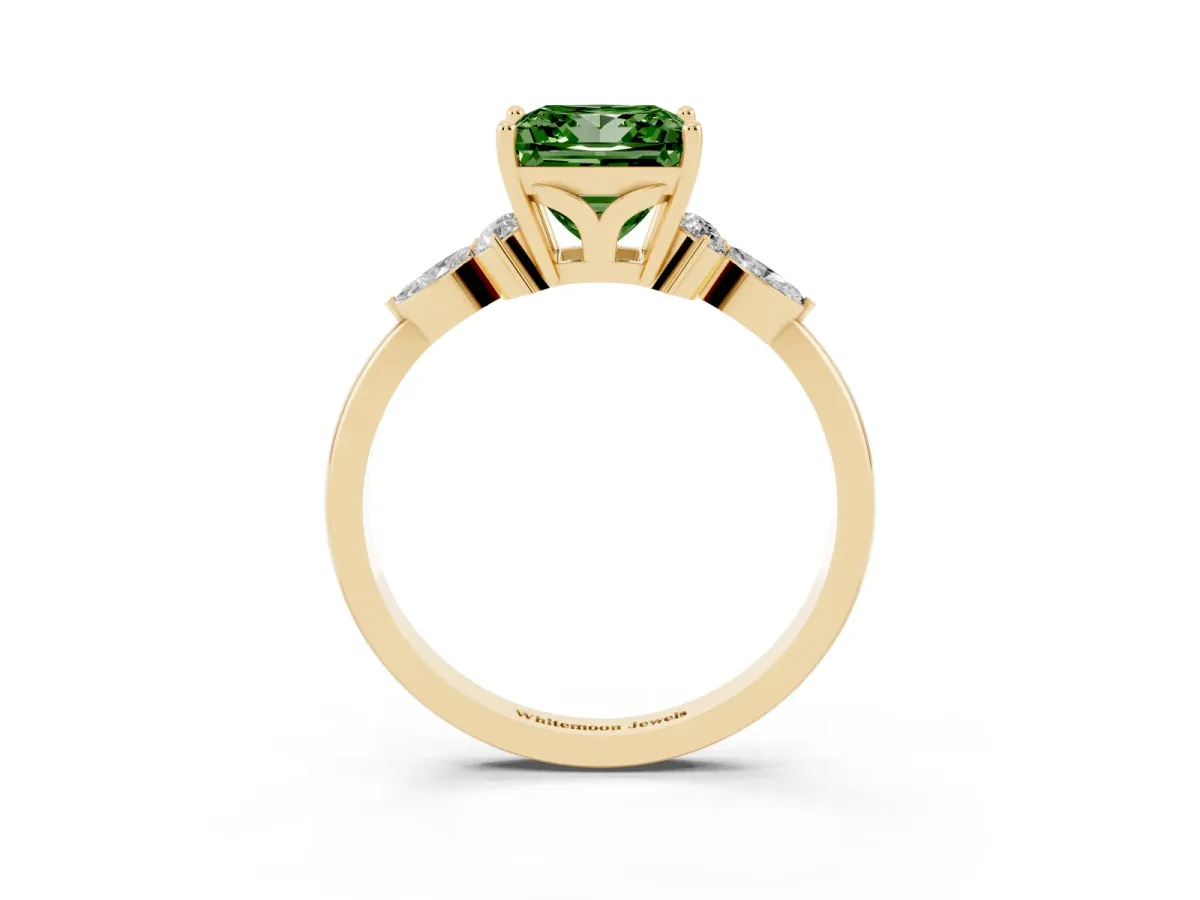 Fancy Green Princess Cut Brilliant Diamond Solitaire Ring with Pear Side Stones and Four-Prong Setting Yellow gold