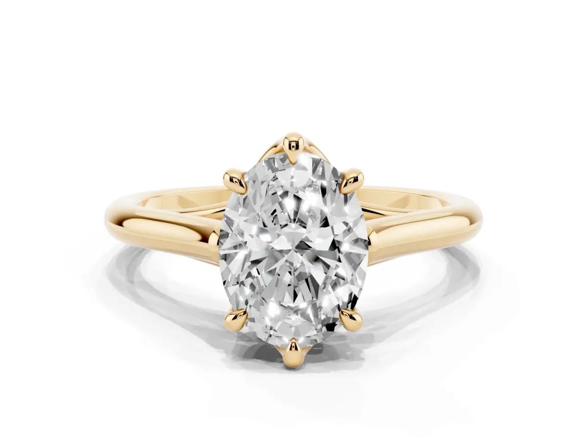 Oval Cut Solitaire Engagement Ring with Six-Prong Setting and Classic Band Yellow gold