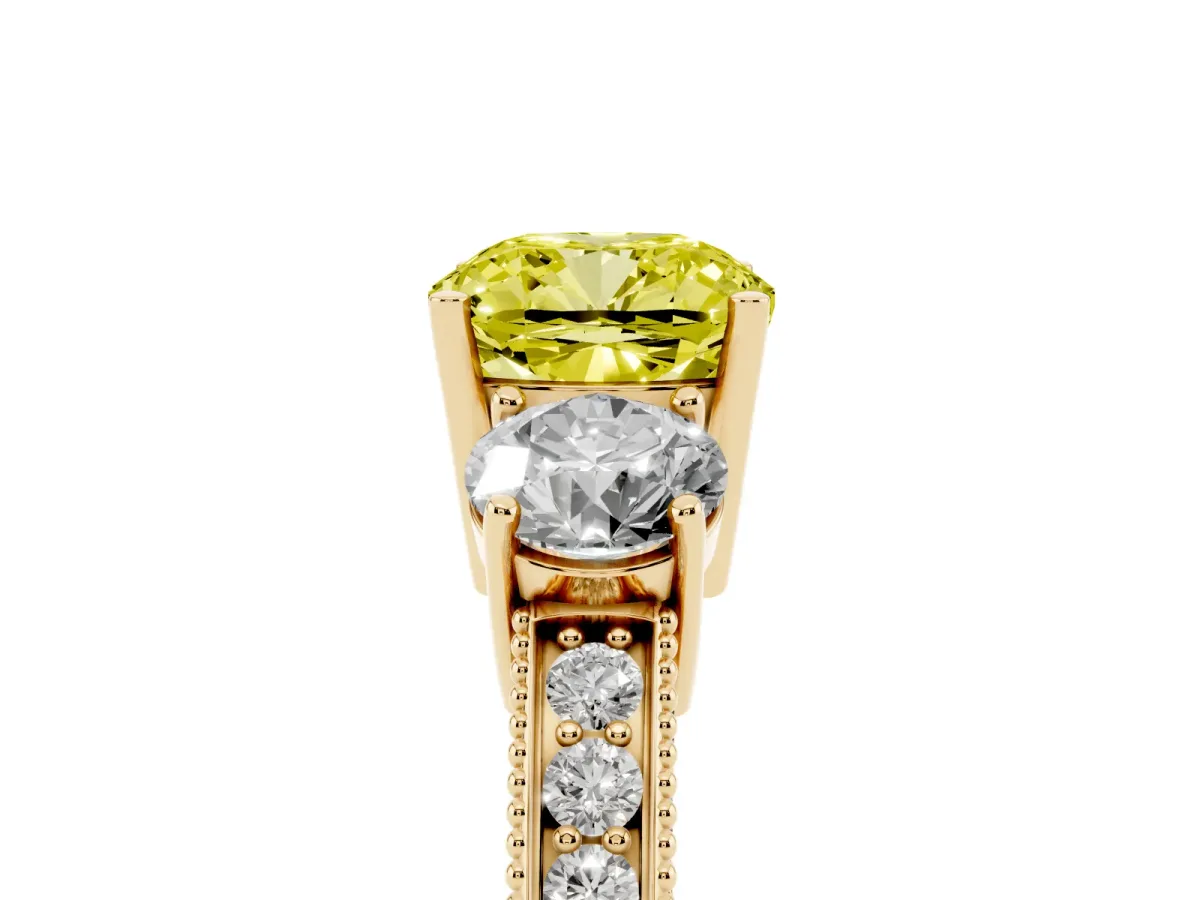 Fancy Yellow Cushion Cut Three-Stone Diamond Ring with Pavé Band and Four-Prong Setting Yellow gold