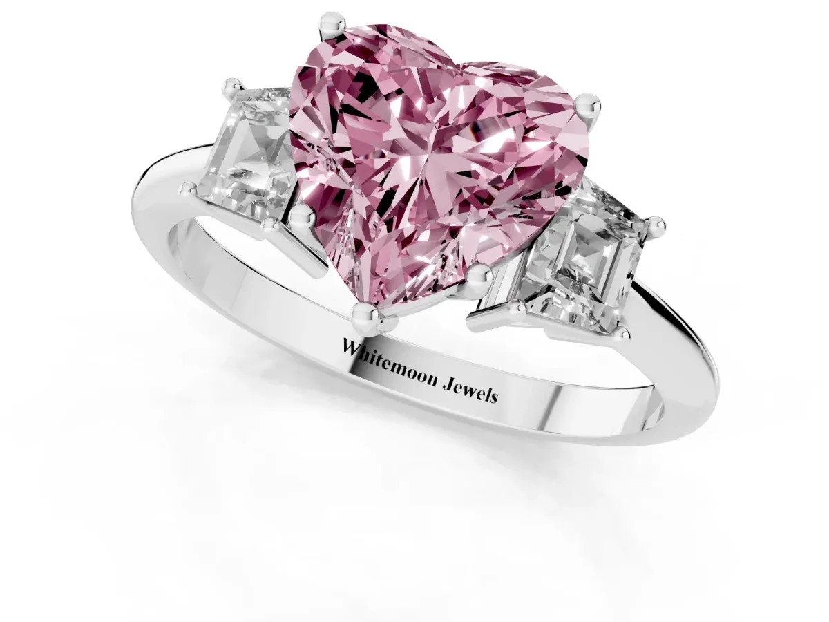 Fancy Pink Heart Cut Diamond Three-Stone Ring with Trapezoid Side Stones and Prong Setting Silver