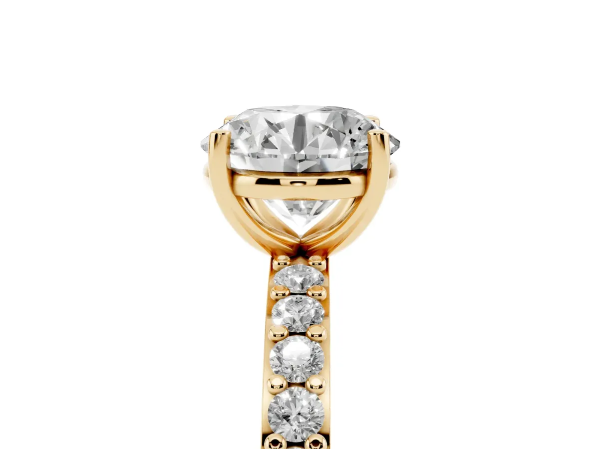 Round Cut Cut Diamond Solitaire with Pave Band and Four-Prong Setting Yellow gold
