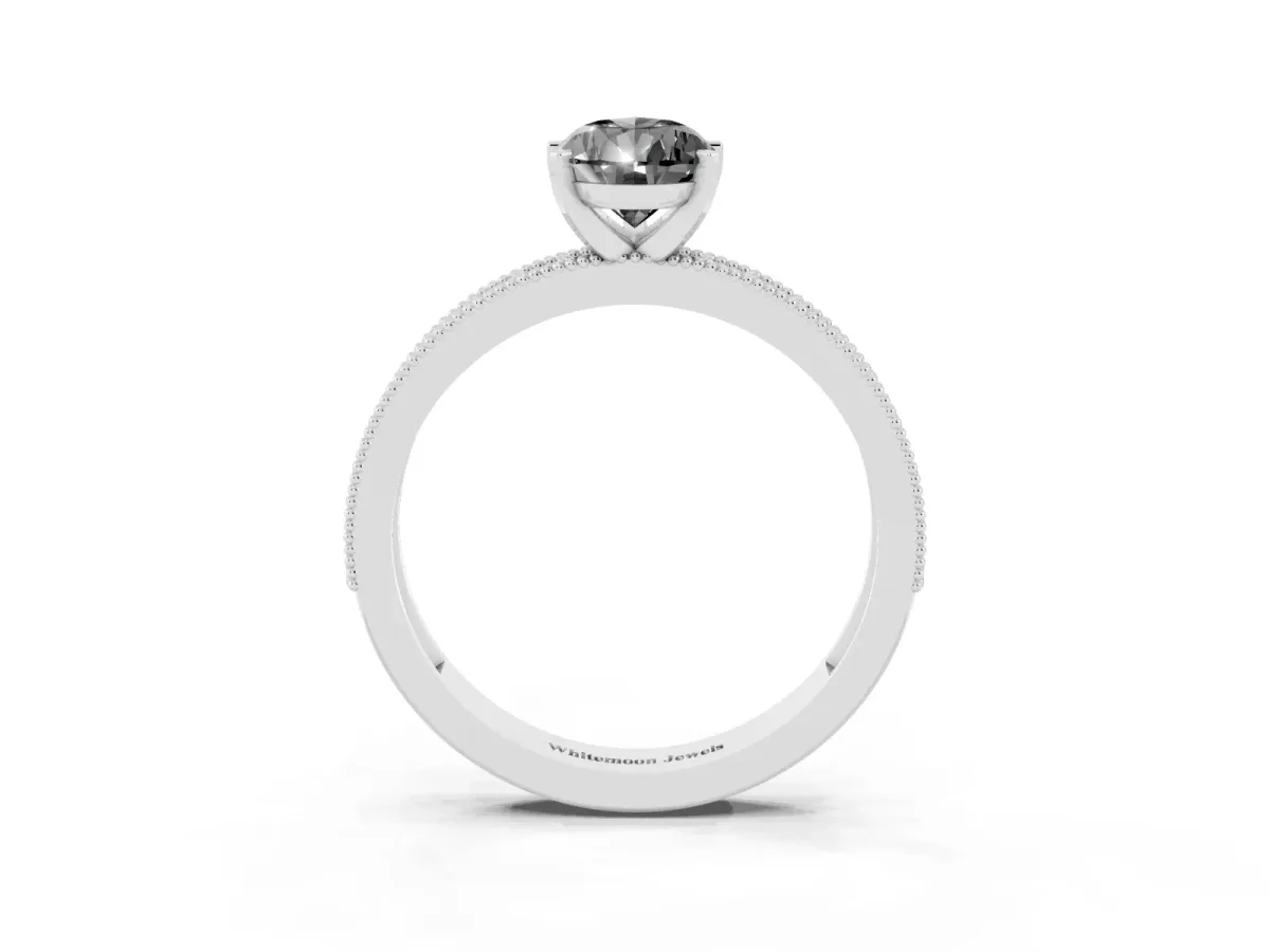 Fancy Black Pear Cut Diamond Milgrain Pavé Engagement Ring with Four-Prong Setting Platinum
