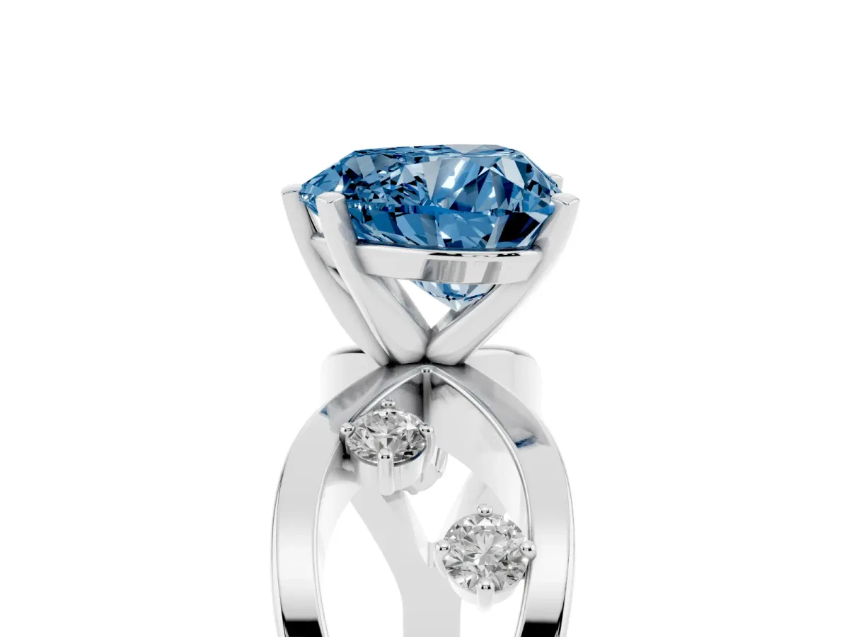 Fancy Blue Heart Cut Cut Solitaire Diamond with Side Stones on Criss-Cross Band and Four-Prong Setting Silver