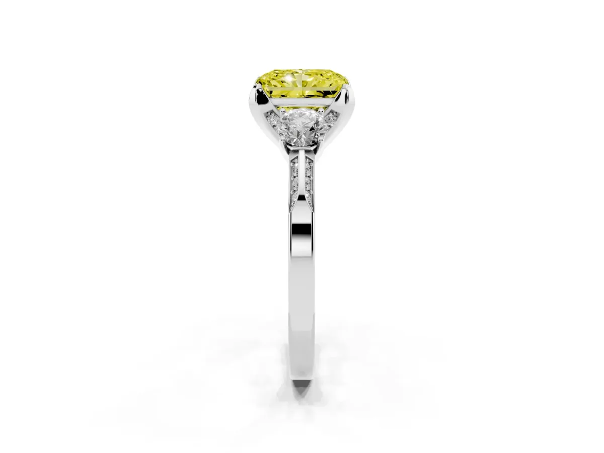 Fancy Yellow Radiant Cut Brilliant Three-Stone Diamond Ring with Pavé Band and Four-Prong Setting White gold