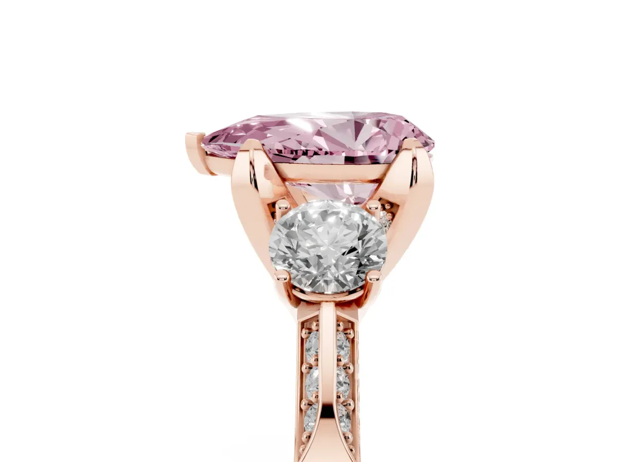 Fancy Pink Pear Cut Brilliant Three-Stone Diamond Ring with Pavé Band and Four-Prong Setting Rose gold