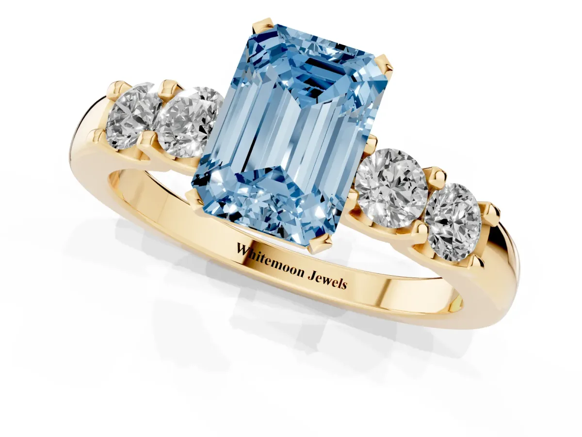 Fancy Blue Emerald Cut Brilliant Cut Diamond Five-Stone Prong Set Engagement Ring with Channel Band Yellow gold