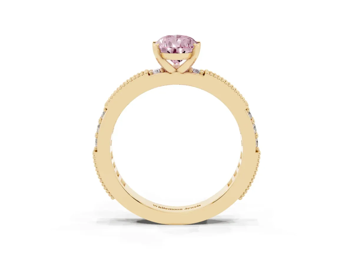 Fancy Pink Pear Cut Solitaire with Pavé Band and Four-Prong Setting Yellow gold
