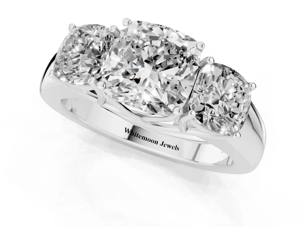 Three-Stone Cushion Cut Cut Diamond Ring with Prong Setting and Classic Band Platinum