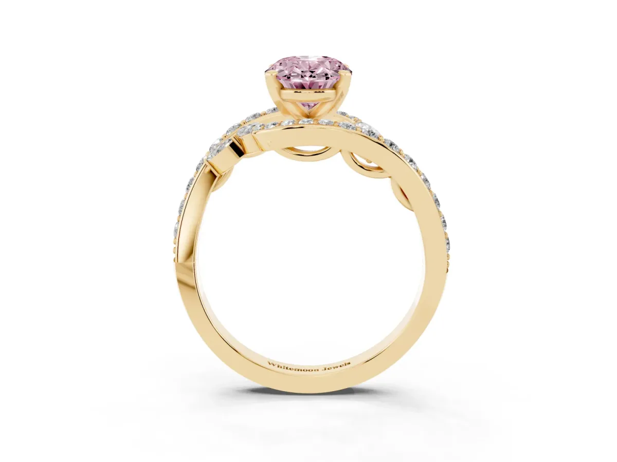 Fancy Pink Oval Cut Solitaire with Pavé Twist Band and Four-Prong Setting Yellow gold