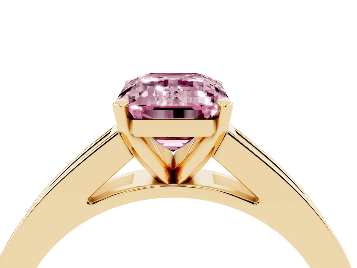 Fancy Pink Emerald Cut Solitaire Diamond Ring with Channel-Set Band and Four-Prong Setting Yellow gold