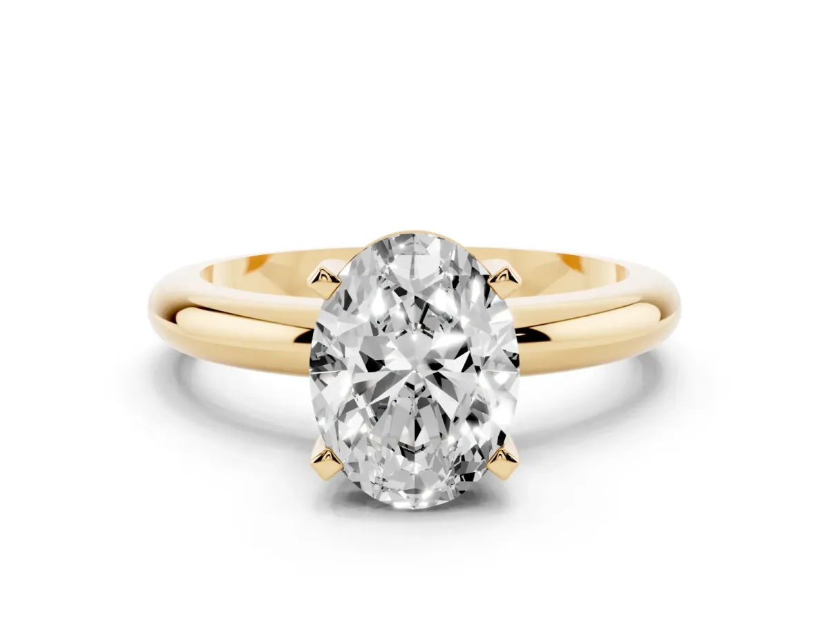 Oval Cut Diamond Solitaire Engagement Ring with Round Band and Four-Prong Setting Yellow gold