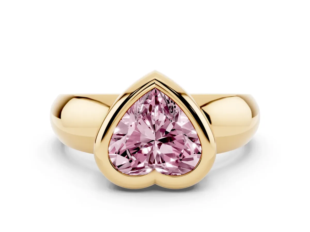 Fancy Pink Bezel Set Heart Cut Solitaire Ring with Wide Band Yellow gold