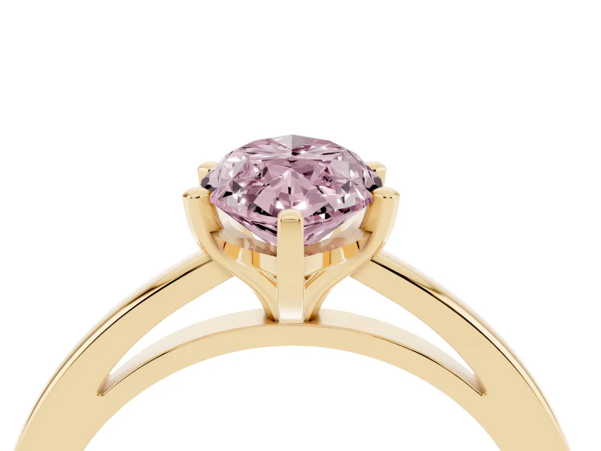Fancy Pink Marquise Cut Solitaire Diamond Engagement Ring with Four-Prong Setting on a Classic Band Yellow gold