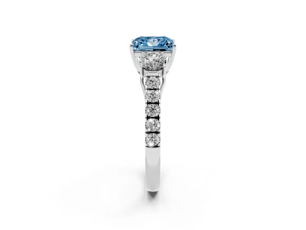 Fancy Blue Princess Cut Cut Diamond Three-Stone Ring with Round Side Stones and Pavé Band Platinum