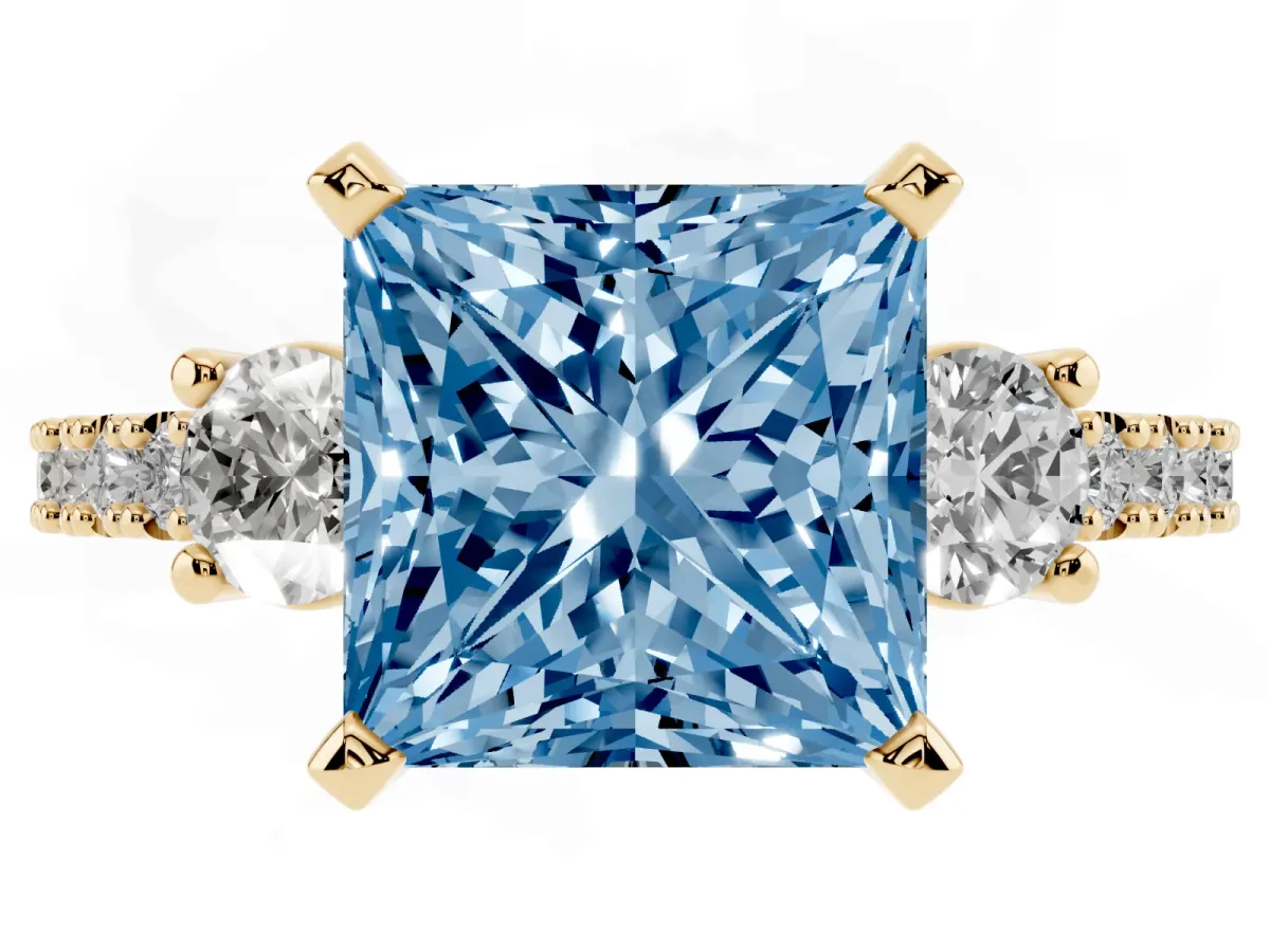 Fancy Blue Princess Cut Three-Stone Diamond Pavé Band with Prong Setting Yellow gold