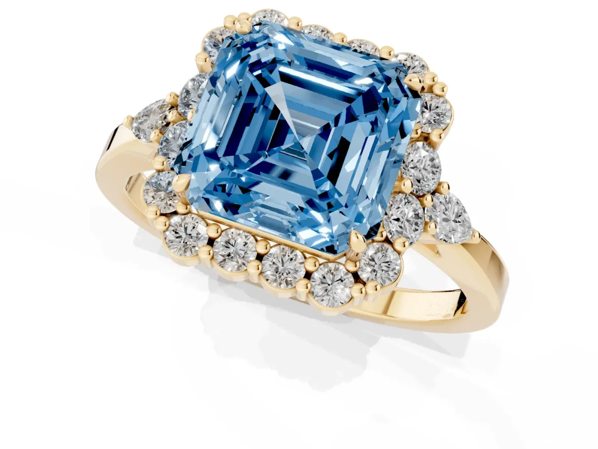 Fancy Blue Asscher Cut Diamond Halo Ring with Pear Side Stones and Prong Setting Yellow gold