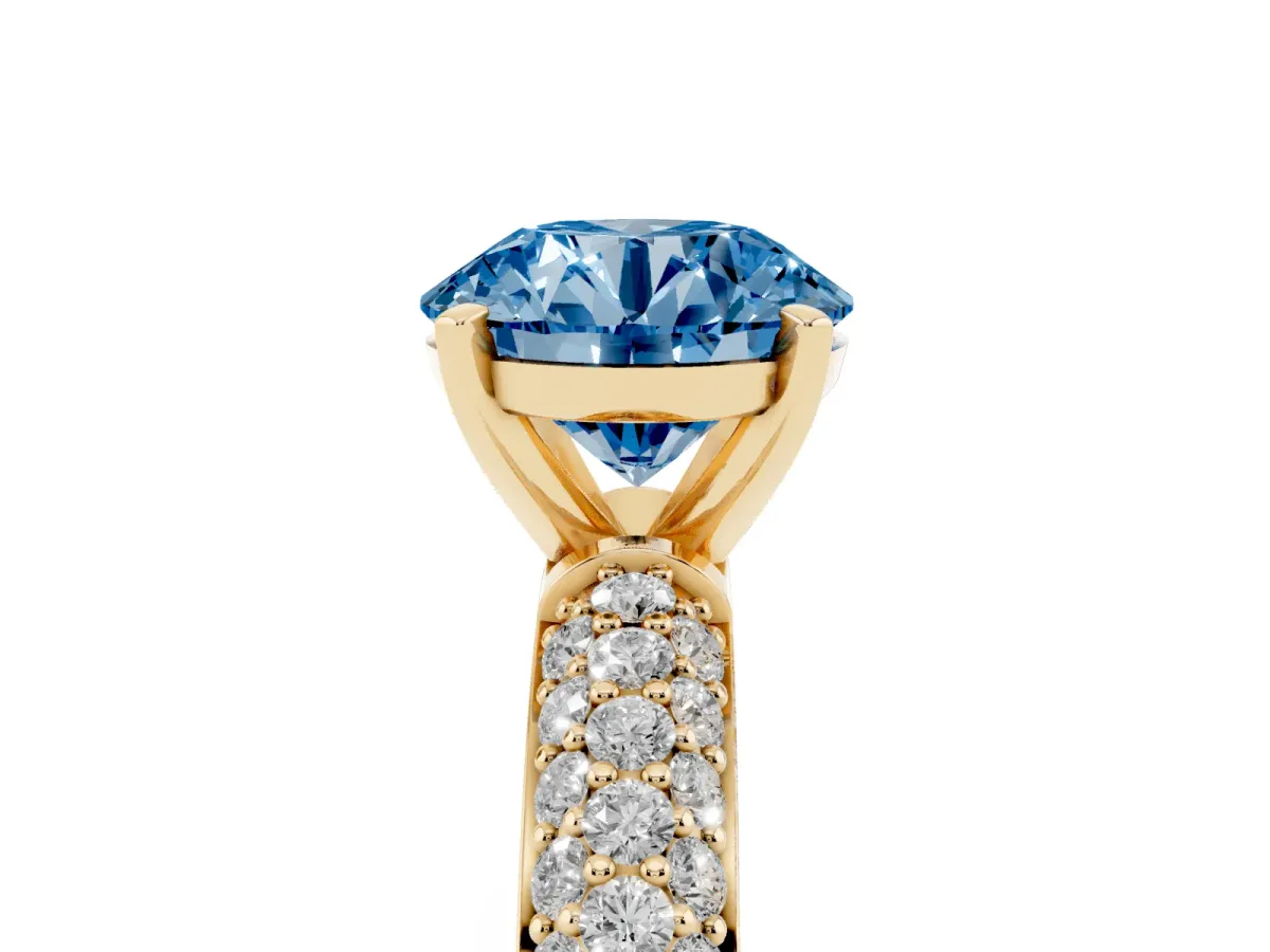 Fancy Blue Round Cut Diamond Solitaire Ring with Prong Setting and Pavé Band Yellow gold