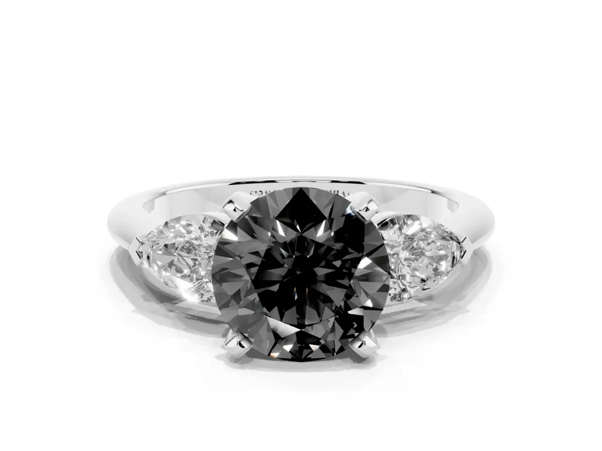 Fancy Black Three-Stone Round Cut Diamond Ring with Pear Side Stones and Four-Prong Setting Silver