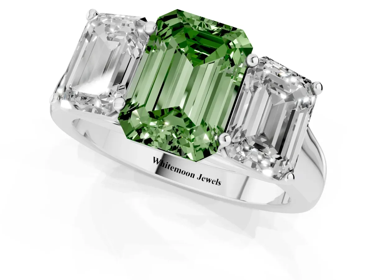 Fancy Green Emerald Cut Three-Stone Diamond Ring with Prong Setting on a Classic Band Silver