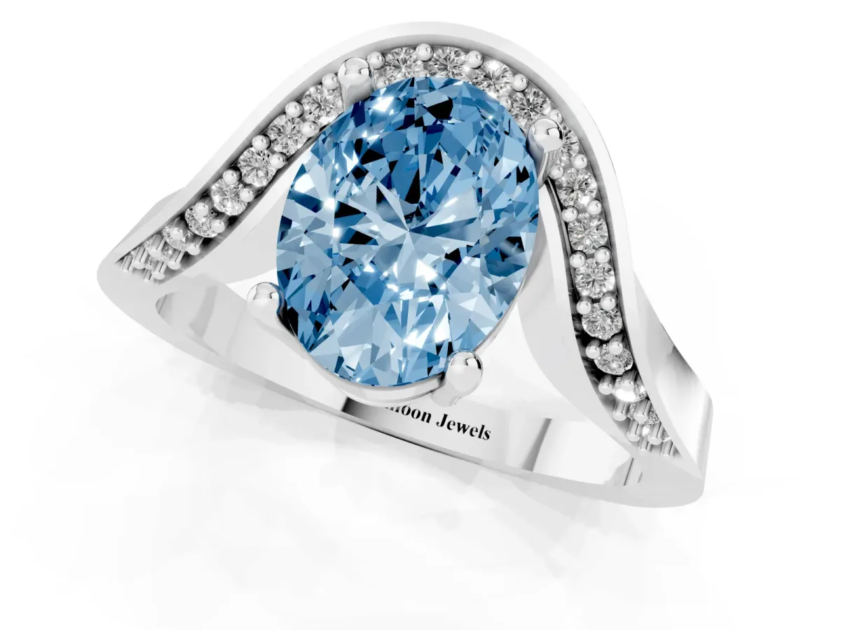 Fancy Blue Oval Cut Solitaire Diamond Engagement Ring with Pave Band and Four-Prong Setting Silver
