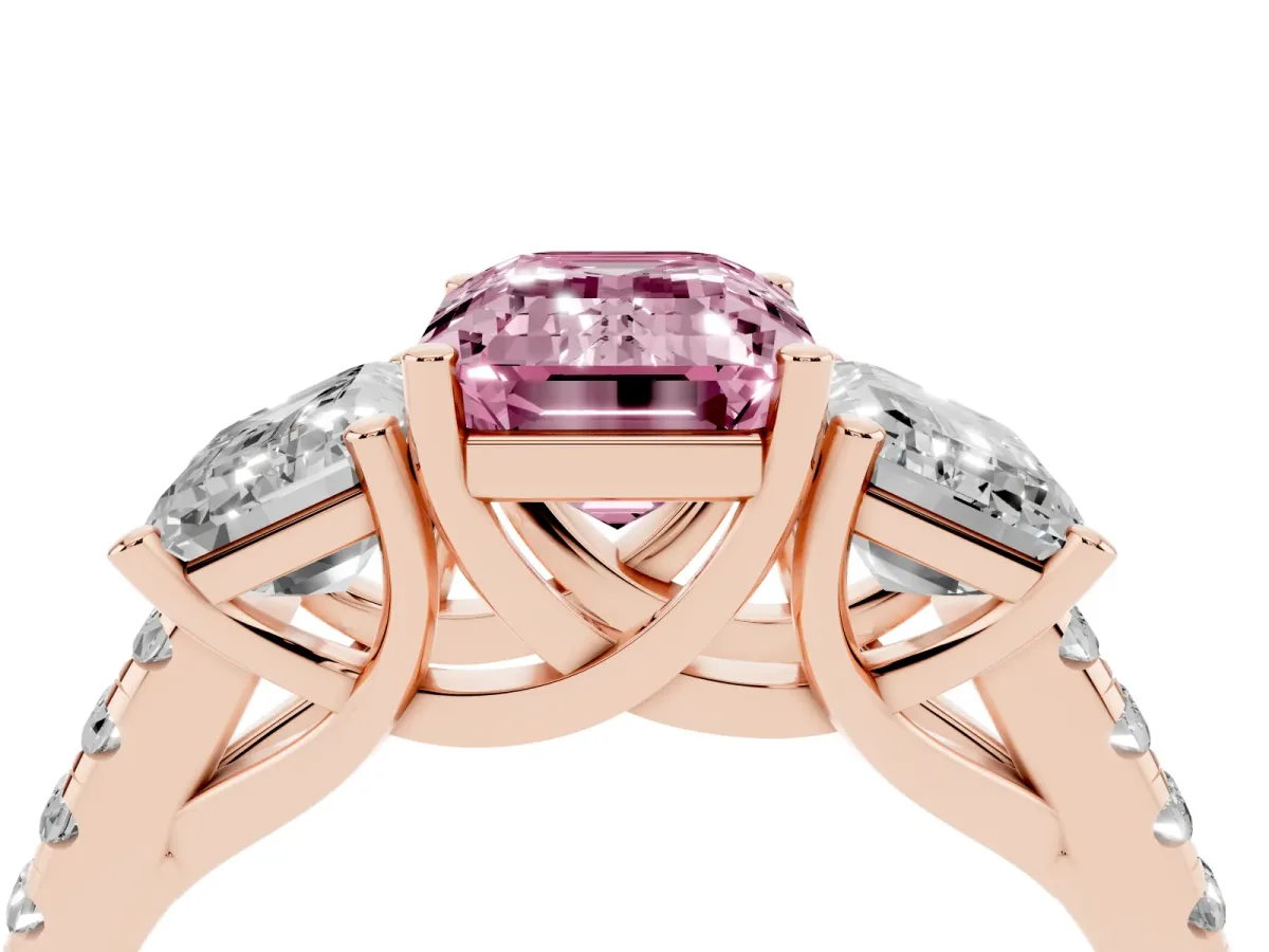Fancy Pink Three-Stone Emerald Cut Diamond Ring with Round Pavé Band and Prong Setting Rose gold