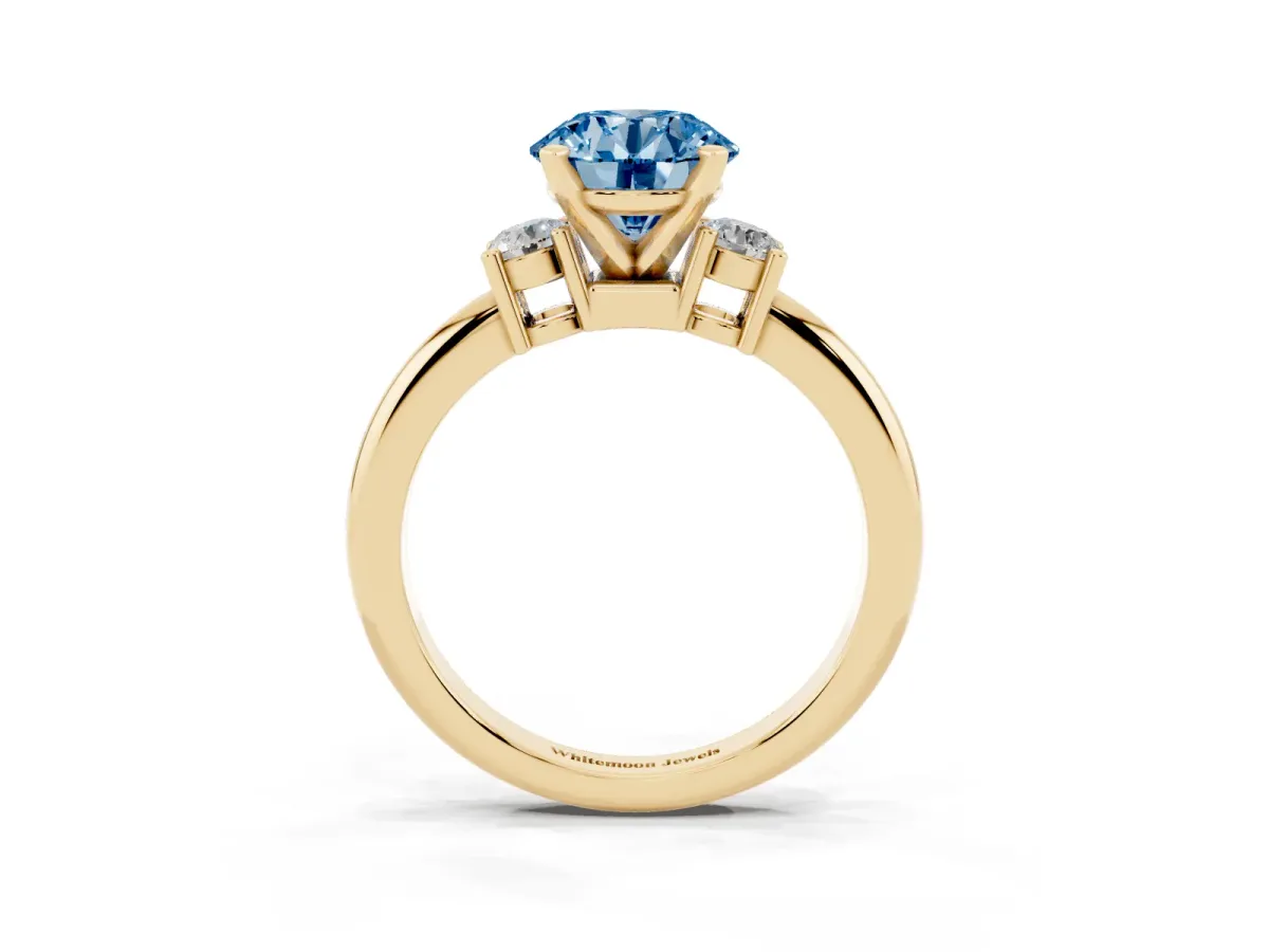 Fancy Blue Three-Stone Round Cut Cut Diamond Solitaire with Prong Setting and Classic Band Yellow gold