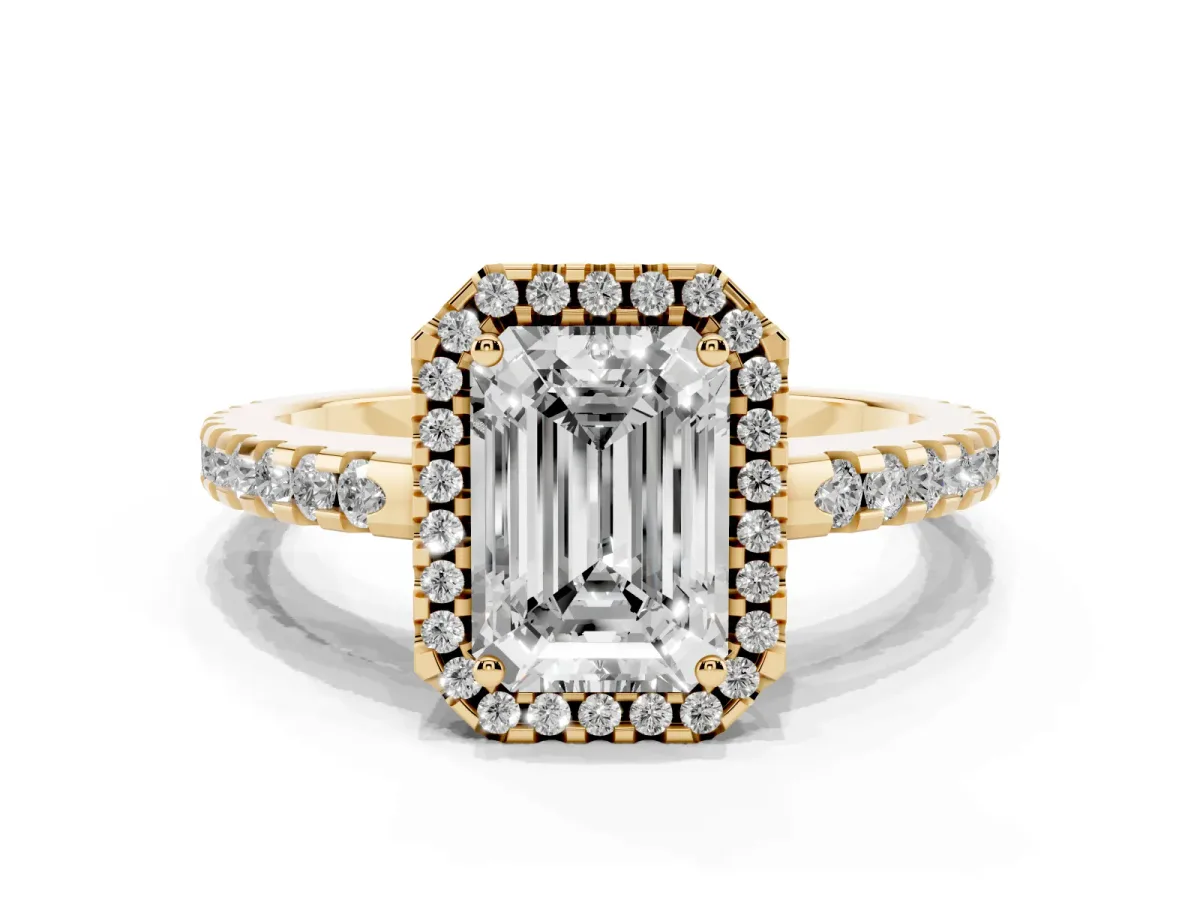 Emerald Cut Diamond Halo Engagement Ring with Pavé Band and Prong Setting Yellow gold