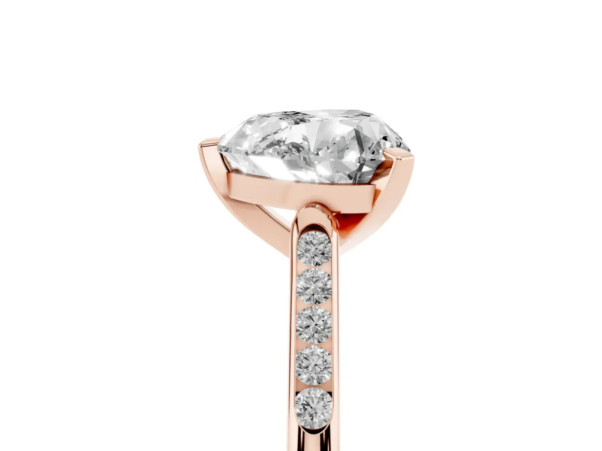 Heart Cut Diamond Solitaire Ring with Channel Set Round Band and Prong Setting Rose gold