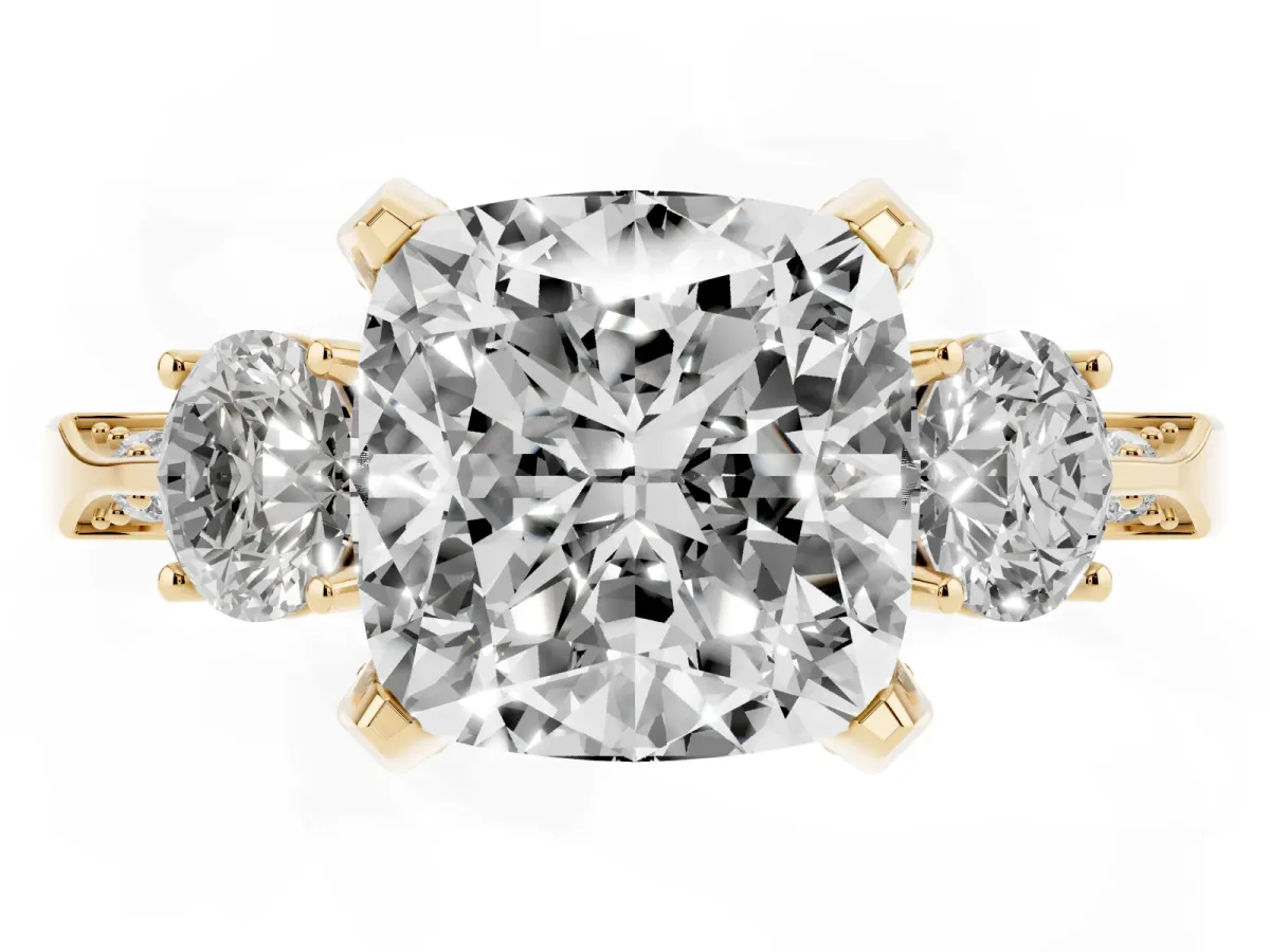 Cushion Cut Brilliant Three-Stone Diamond Ring with Pavé Band and Four-Prong Setting Yellow gold