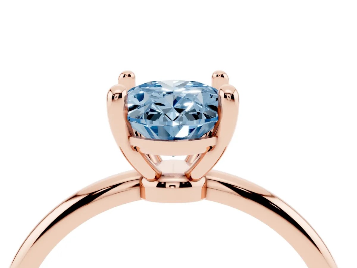 Fancy Blue Oval Cut Solitaire Diamond Ring with 4-Prong Setting on a Classic Band Rose gold