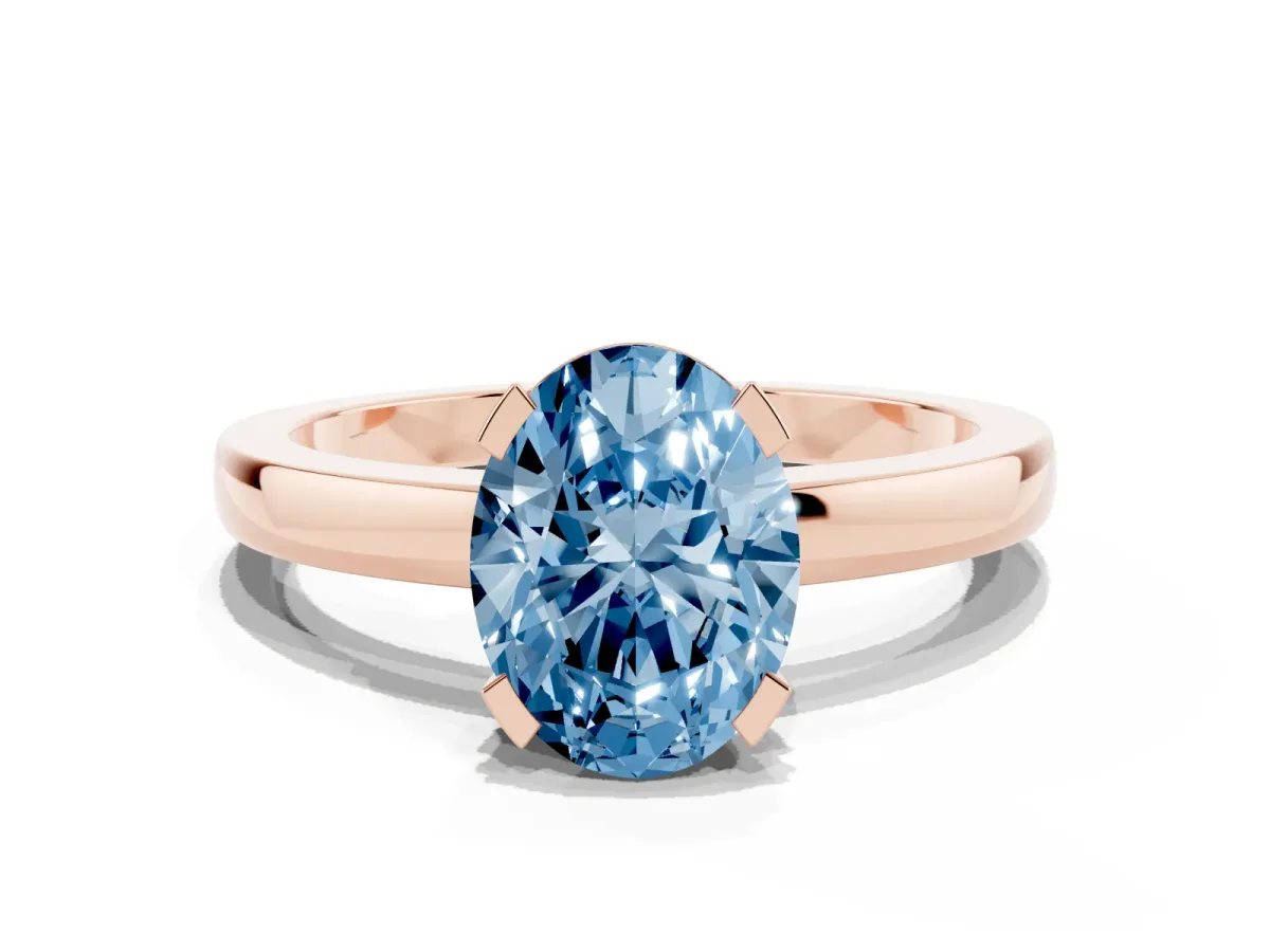 Fancy Blue Oval Cut Cut Solitaire Ring with Four-Prong Setting and Classic Band Rose gold