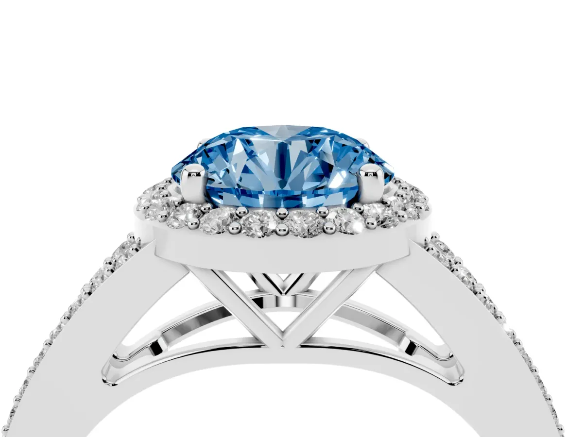 Fancy Blue Round Cut Halo Split Shank Pave Diamond Ring with Four-Prong Setting Silver
