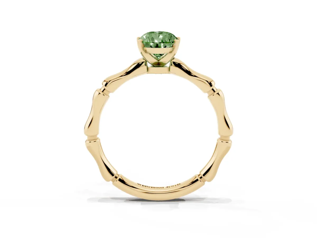 Fancy Green Pear Cut Solitaire Diamond Ring with Bamboo Band and Four-Prong Setting Yellow gold