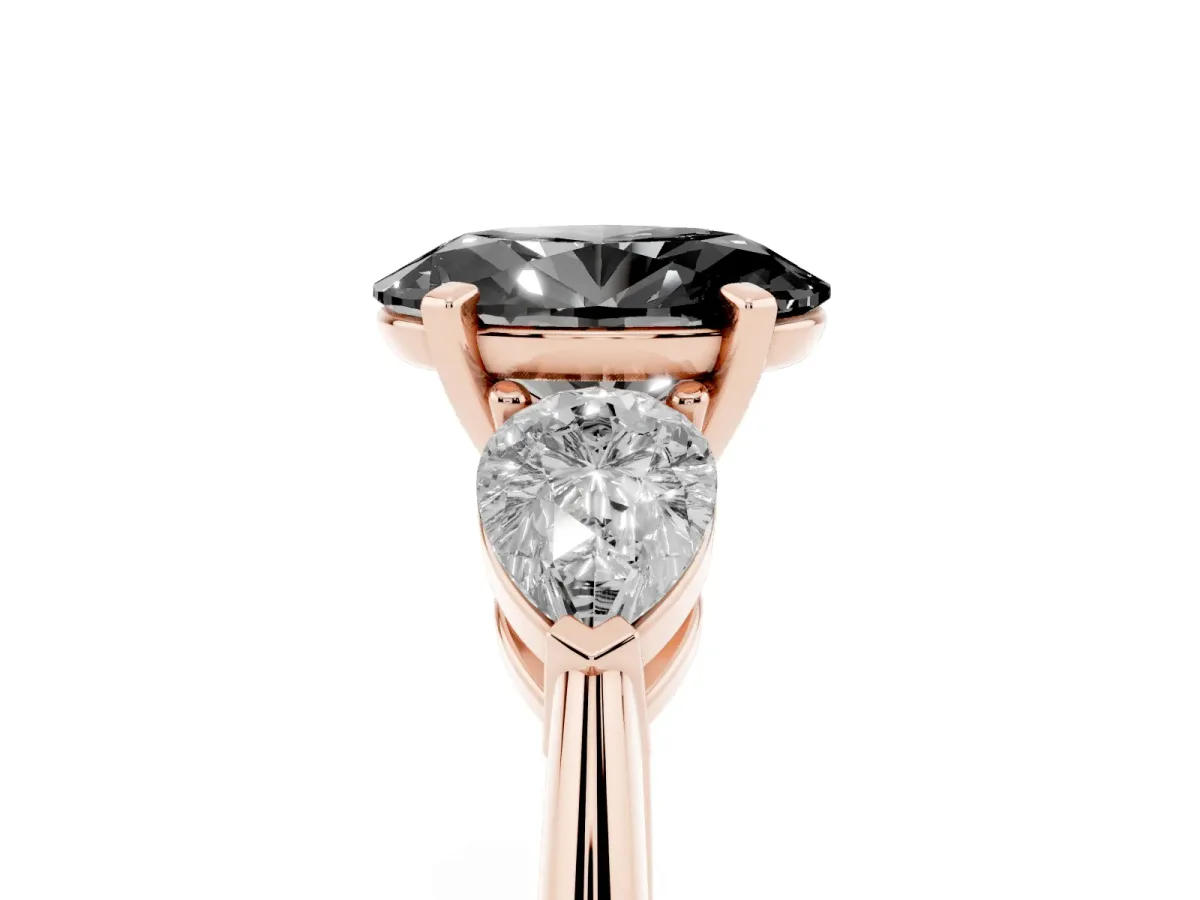 Fancy Black Three-Stone Oval Cut Diamond Ring with Pear Side Stones and Four-Prong Setting Rose gold