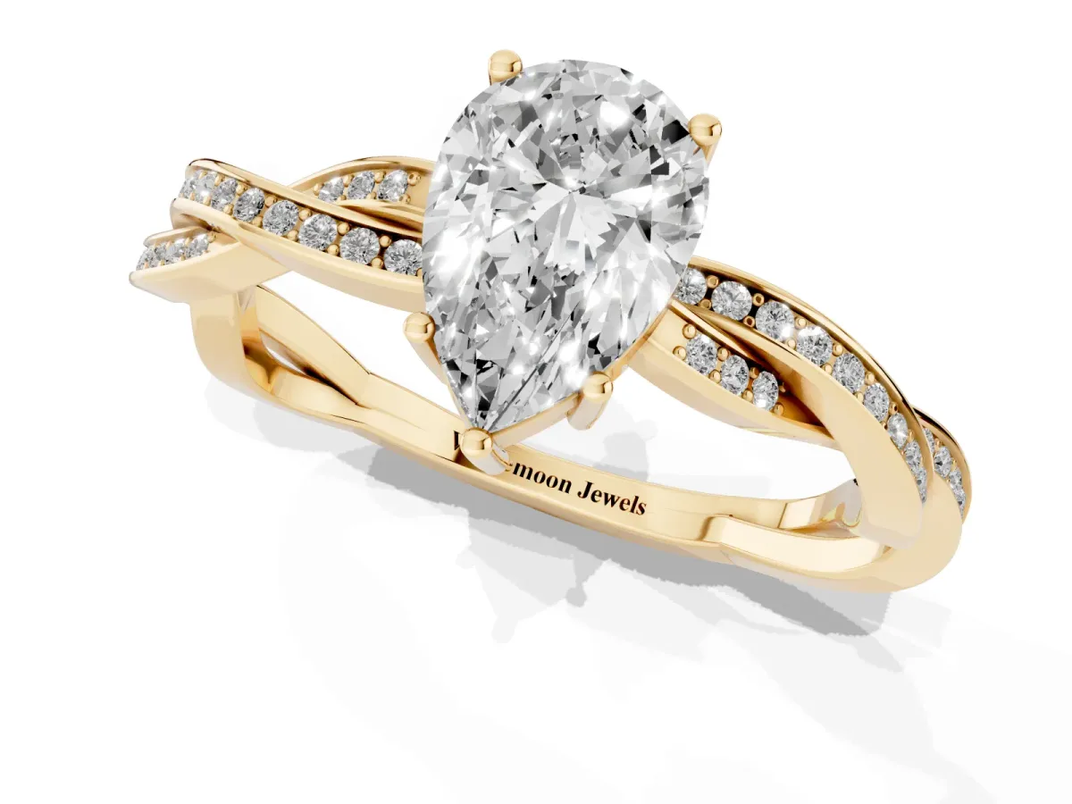 Pear Cut Solitaire Twisted Pave Diamond Ring with Four-Prong Setting Yellow gold