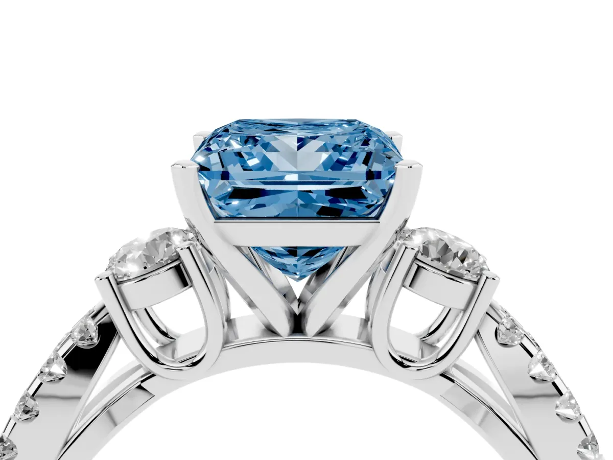 Fancy Blue Princess Cut Diamond Three-Stone Ring with Pavé Split Shank and Four-Prong Setting Silver