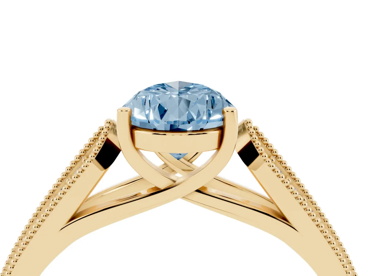 Fancy Blue Pear Cut Cut Pave Split Shank Engagement Ring with Four-Prong Setting Yellow gold