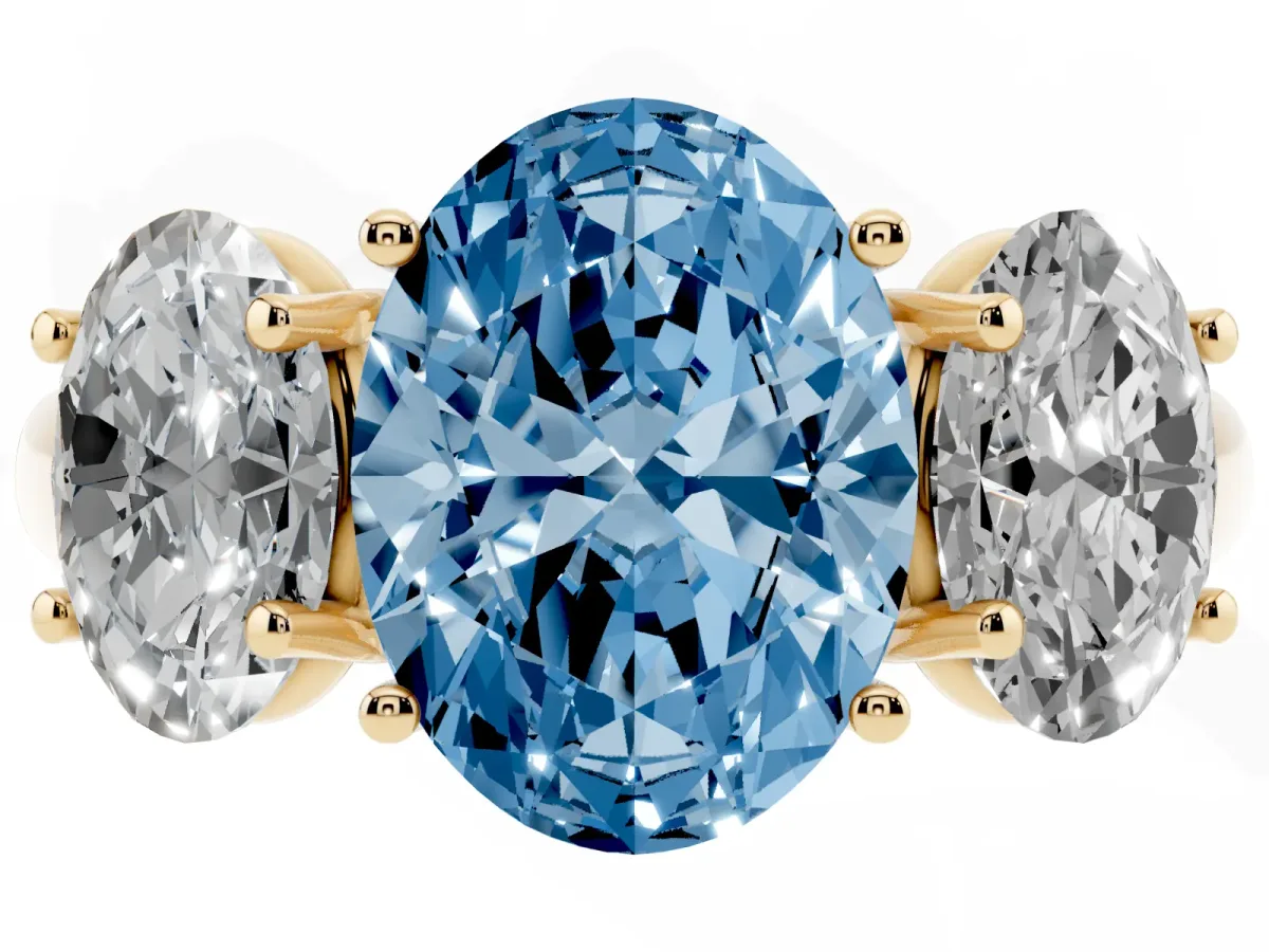 Fancy Blue Three-Stone Oval Cut Diamond Engagement Ring with Prong Setting Yellow gold