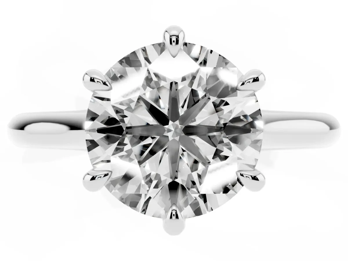 Round Cut Solitaire Engagement Ring with Six-Prong Setting and Classic Band Silver