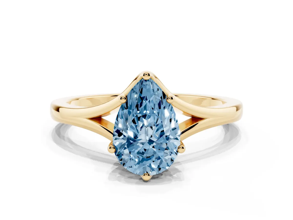 Fancy Blue Pear Cut Solitaire Diamond Ring with Six-Prong Setting and Tapered Band Yellow gold