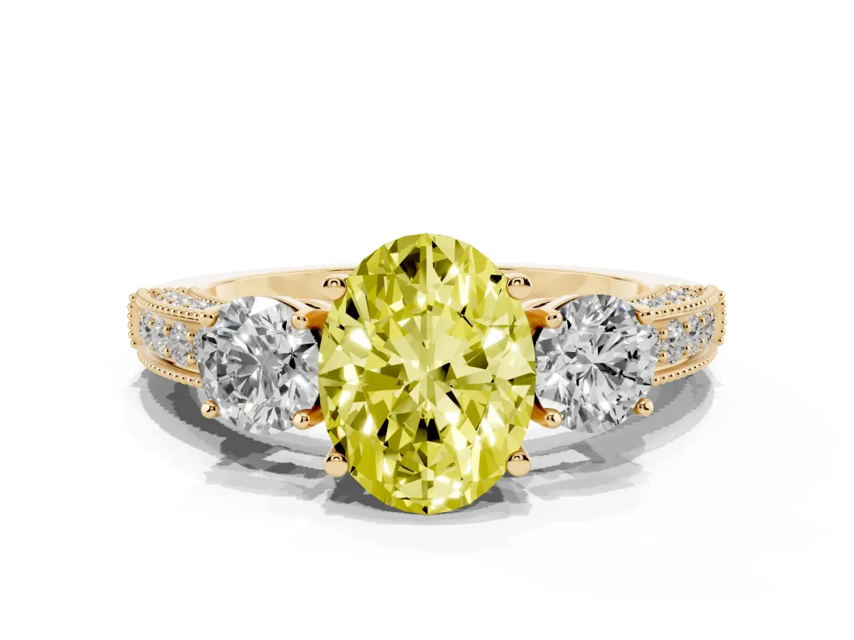 Fancy Yellow Oval Cut Three-Stone Diamond Ring with Pavé Band and Four-Prong Setting Yellow gold