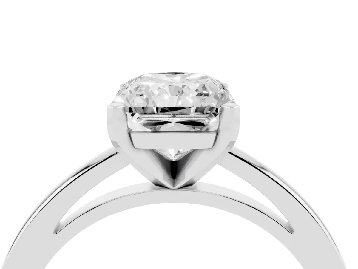 Radiant Cut Solitaire Diamond Engagement Ring with Four-Prong Setting on a Classic Band Silver