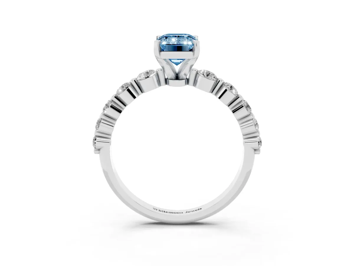 Fancy Blue Emerald Cut Solitaire Diamond Ring with Pave Band and Four-Prong Setting Silver