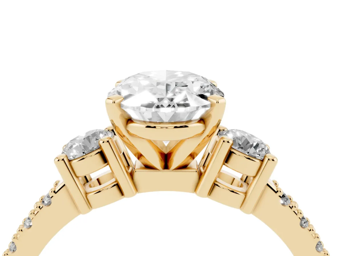 Oval Cut Three-Stone Diamond Pavé Band with Prong Setting Yellow gold