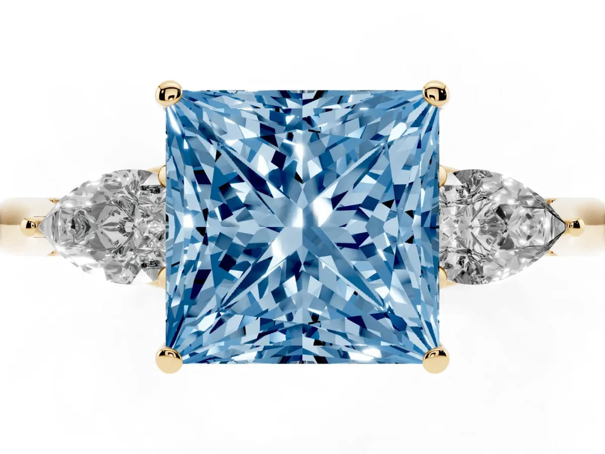 Fancy Blue Three-Stone Princess Cut Brilliant Diamond Solitaire Ring with Tapered Band and Four-Prong Setting Yellow gold