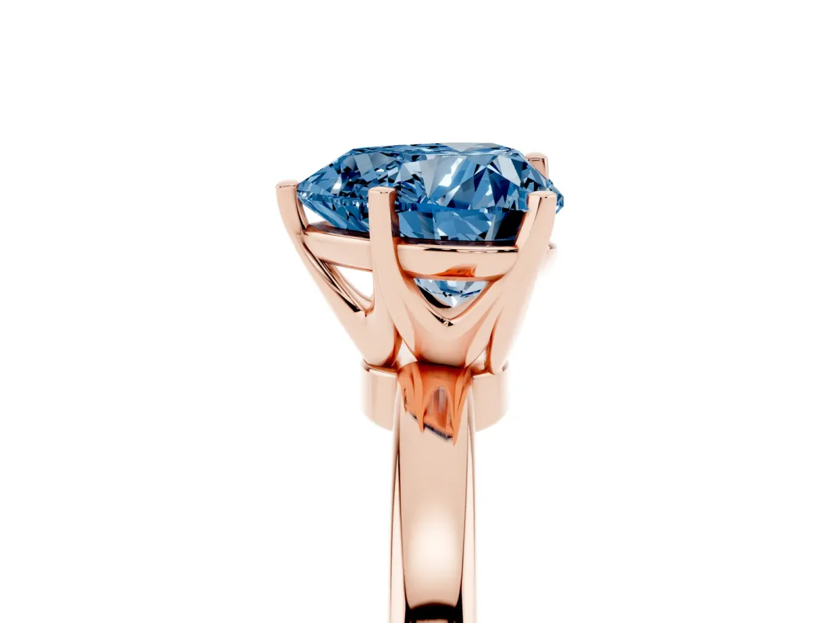 Fancy Blue Heart Cut Solitaire Diamond Ring with Six-Prong Setting on a Classic Band Rose gold